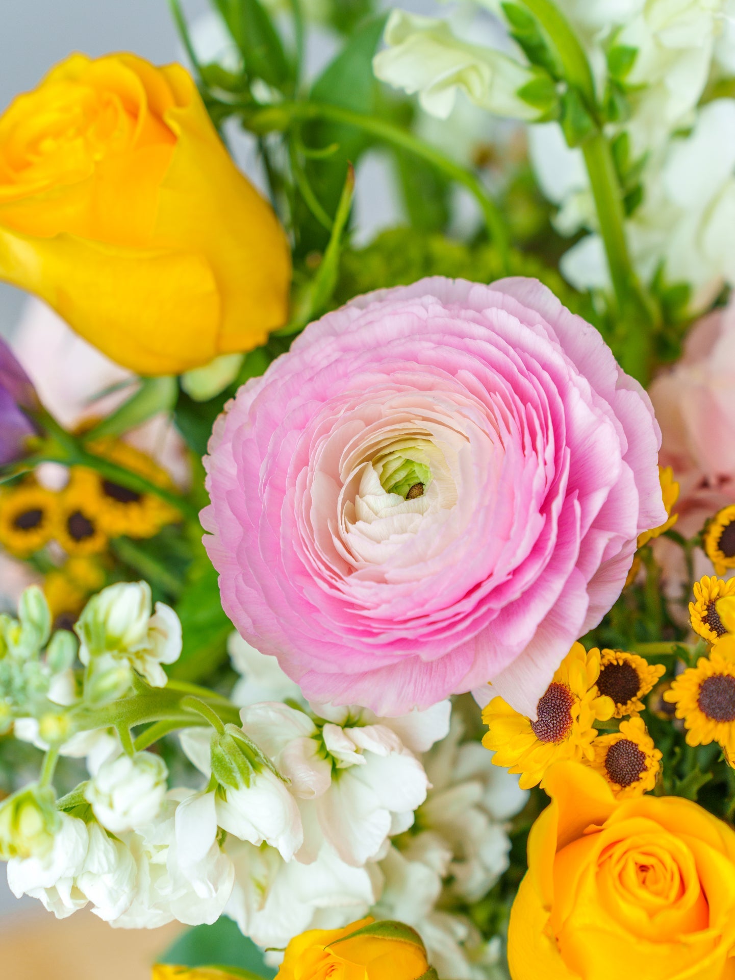 Whimsical Meadow mixed flower bouquet arranged in a vase.